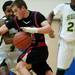 Pickney senior Connor Stephens drives in the game against Huron on Monday, March 4. Daniel Brenner I AnnArbor.com
